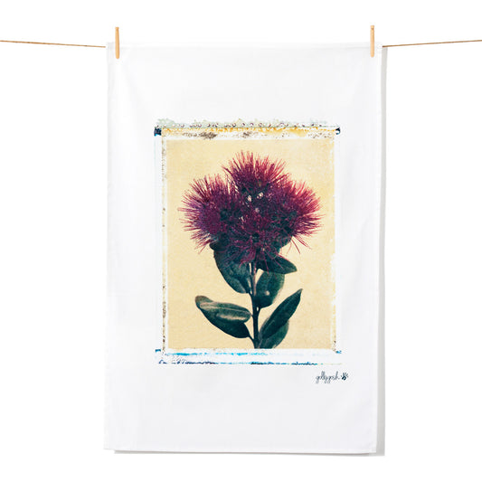 A striking pohutukawa flower created using a delicate polaroid lift off technique on a quality cotton tea towel from Golly Gosh Creations.