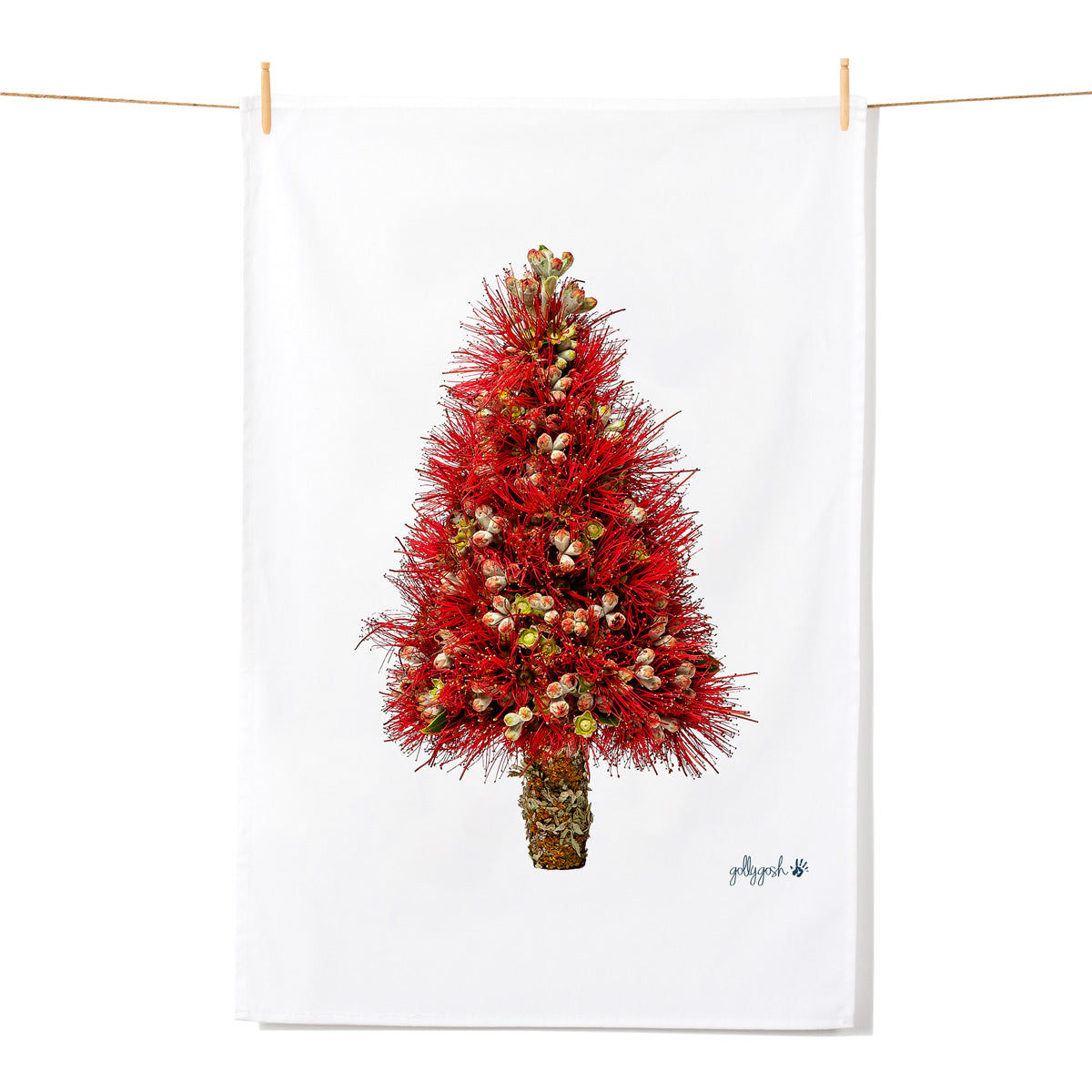 A christmas tree shape created from fresh pohutukawa flowers. A quality cotton tea towel from Golly Gosh Creations.