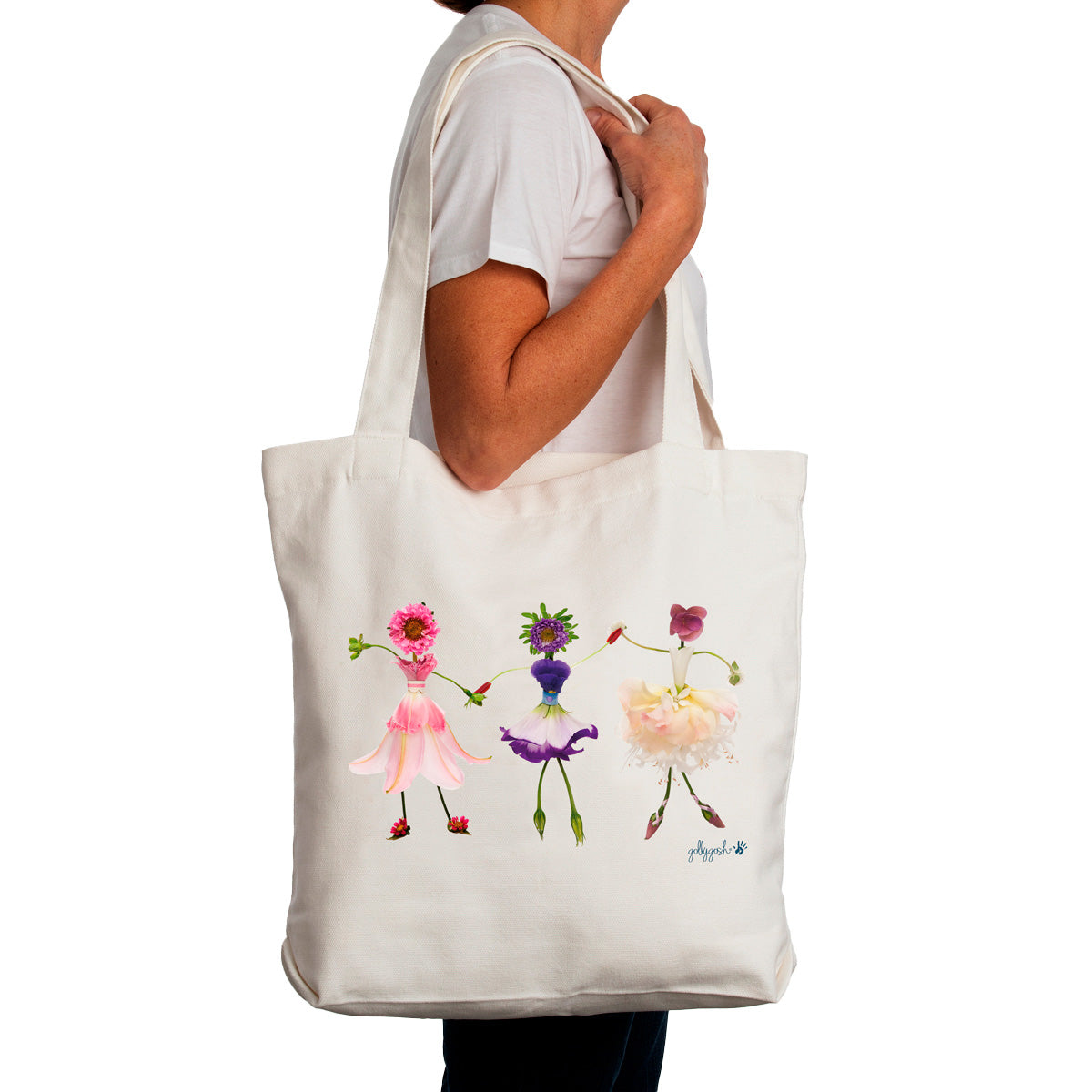 Showcasing three flower girls dancing on this strong everyday cream cotton canvas tote bag by Golly Gosh Creations.