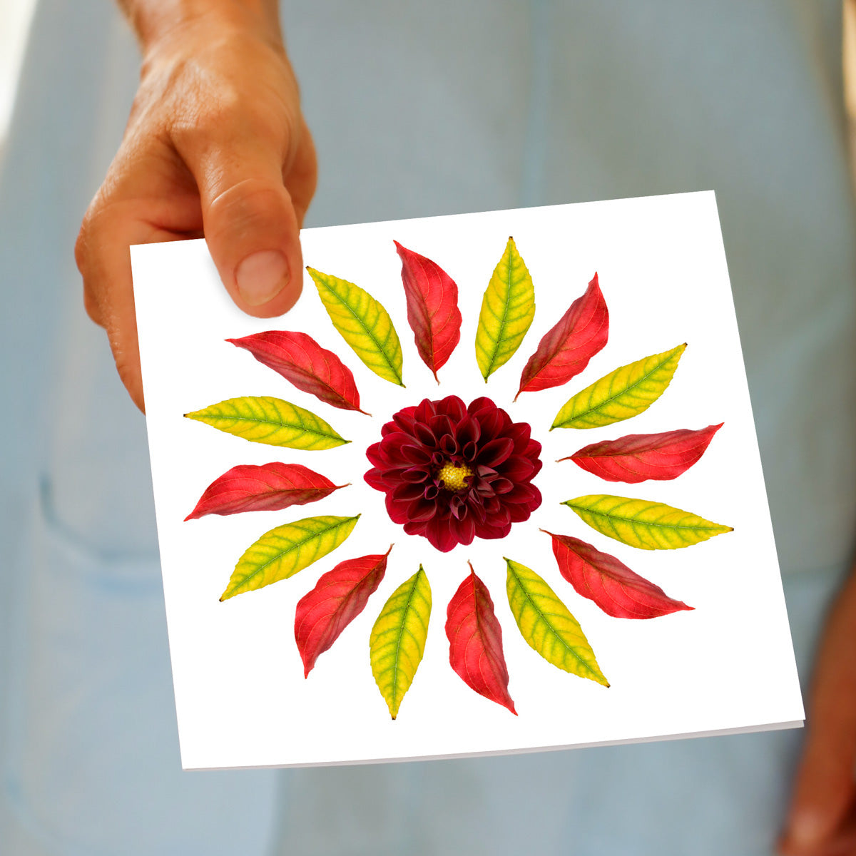 A hand held leaf circle greeting card. Found at Golly Gosh Creations. A generous square card created from a rich dahlia flower and vibrant autumn leaves.