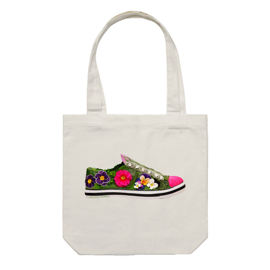 This pansy shoe cotton canvas tote bag from Golly Gosh Creations, is created with colourful dainty pansies, and various green leaves. Colour cream.