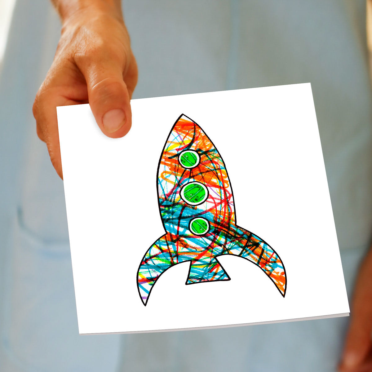 A colourful greeting card with a kids drawing of a rocket on a white background. Found at Golly Gosh Creations. Size 142 x 142mm.