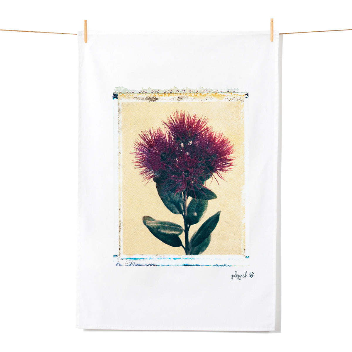 A striking pohutukawa flower created using a delicate polaroid lift off technique on a quality cotton tea towel from Golly Gosh Creations.
