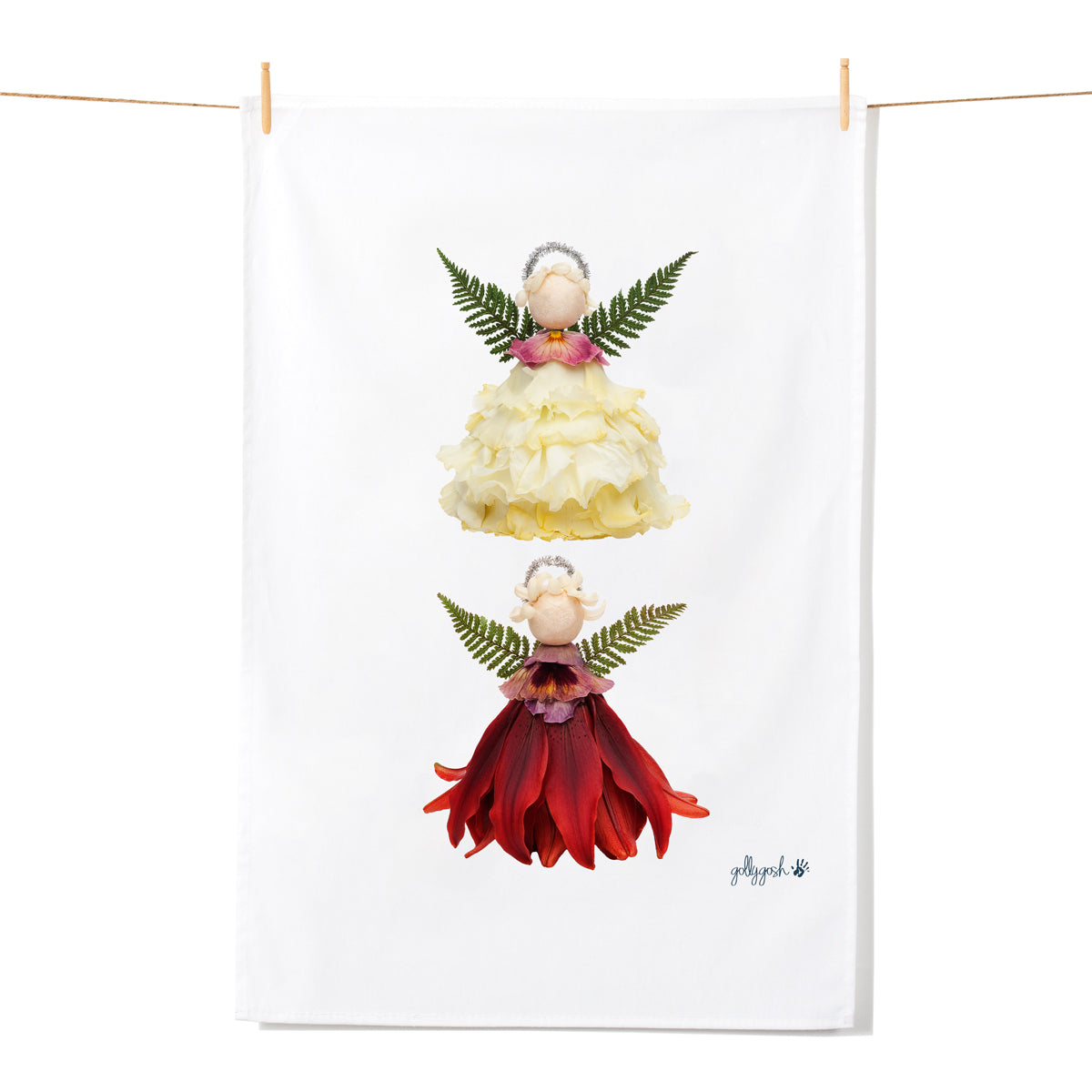 Two christmas angels created from fresh cream roses and red lily flowers. A quality cotton tea towel from Golly Gosh Creations.