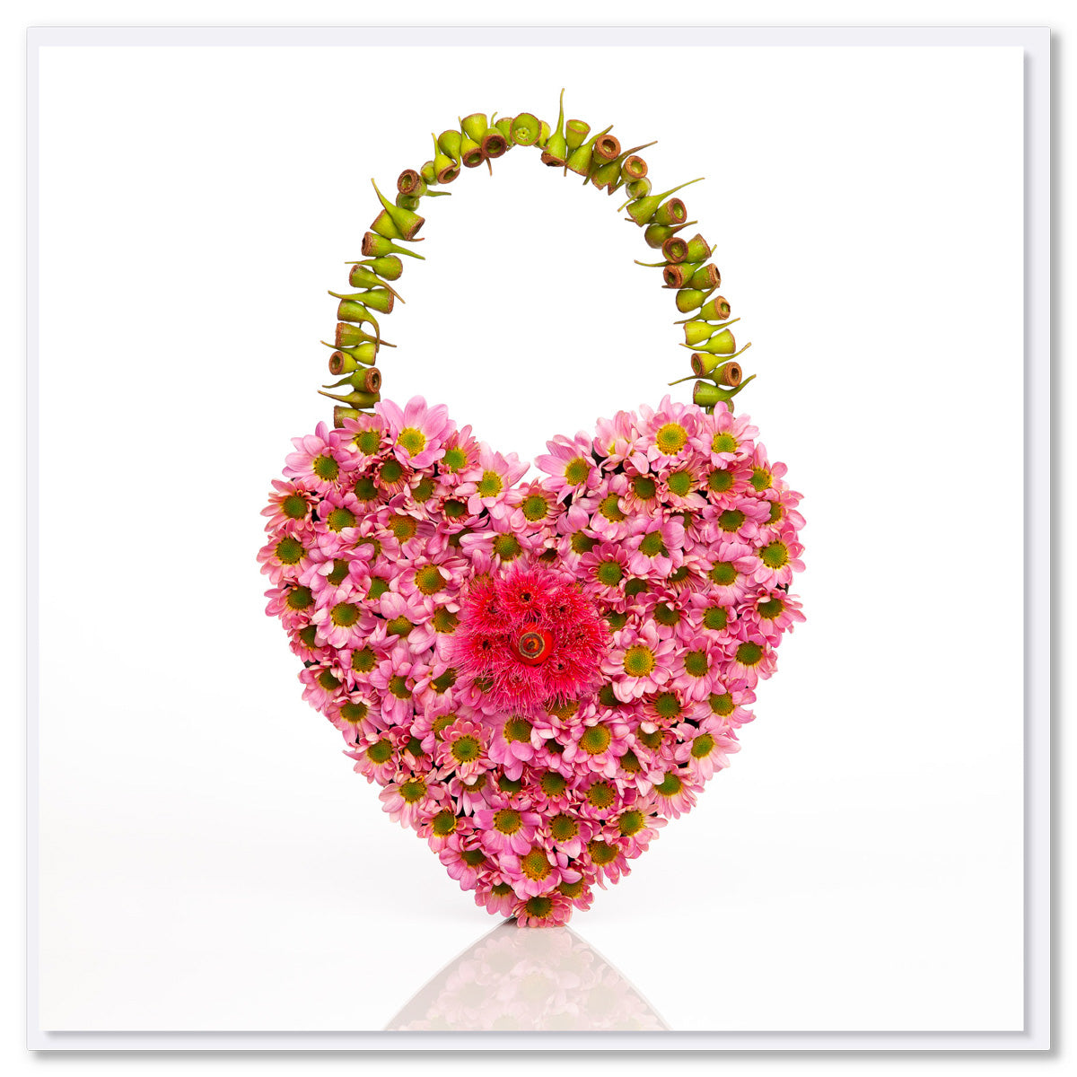 A dainty chrysanthemum heart greeting card. Created from sweet pink chrysanthemum flowers. This quality square card is from Golly Gosh Creations.