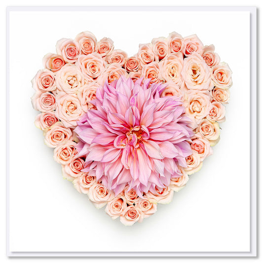 A beautiful pink dahlia heart greeting card.  Handcrafted from soft pink roses and a luscious pink dahlia flower. A quality square card found at Golly Gosh Creations.