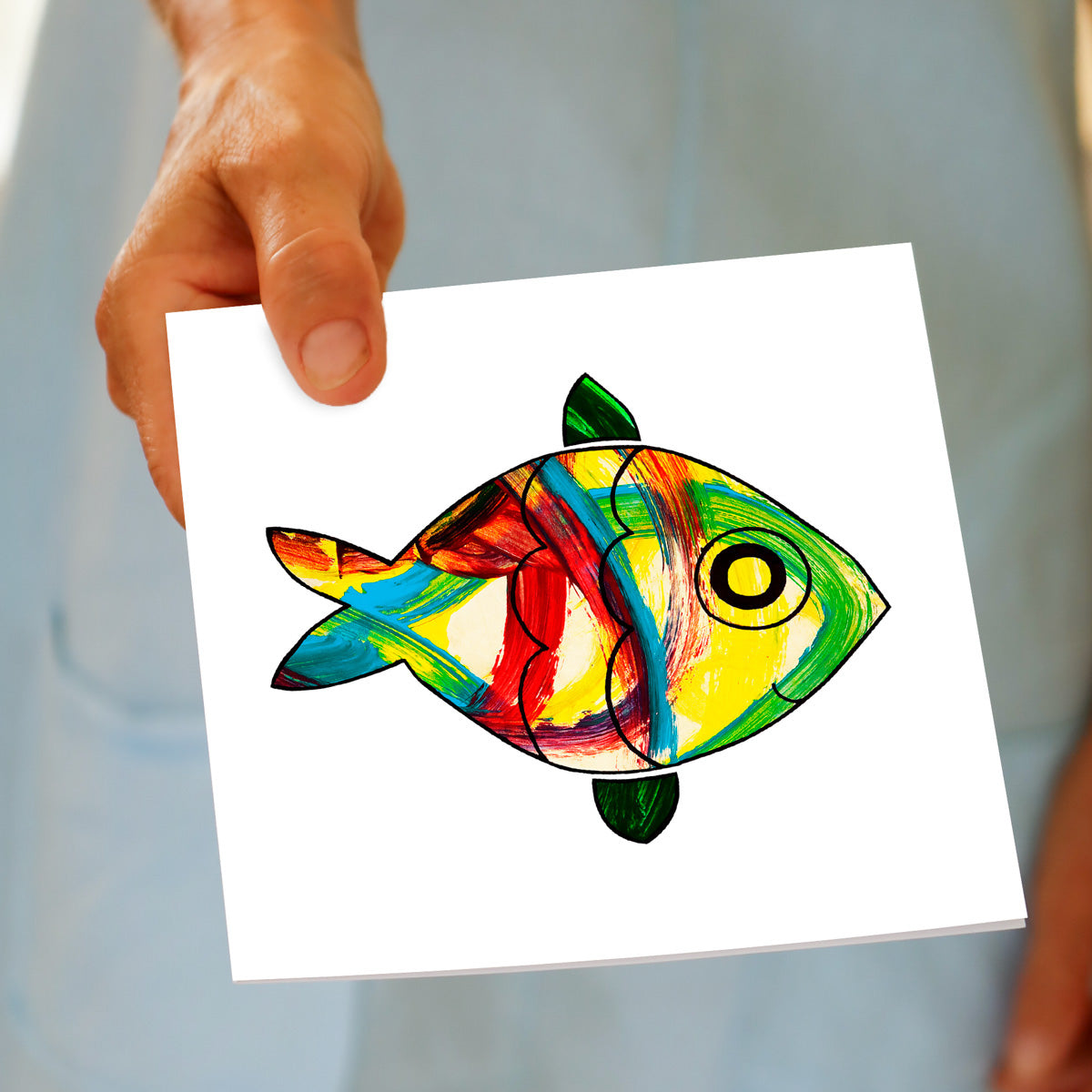 Hand held colourful kids fish greeting card. A hand painted fun card from Golly Gosh Creations. Size 142 x 142 mm.