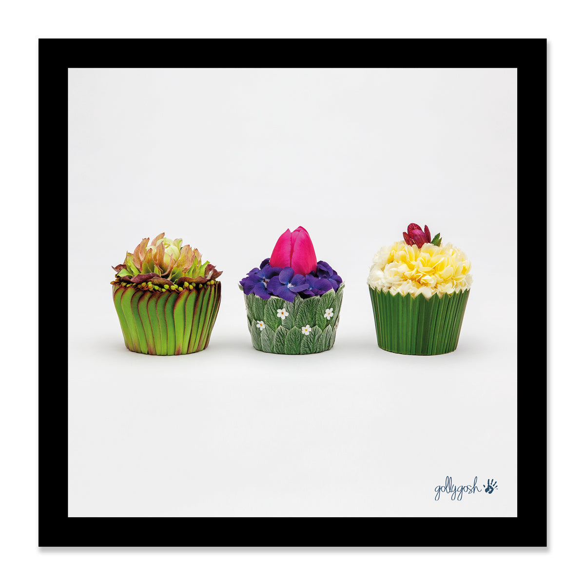 Mock up of a framed floral cupcakes fine art print from Golly Gosh Creations. Available in three sizes ready for framing. 