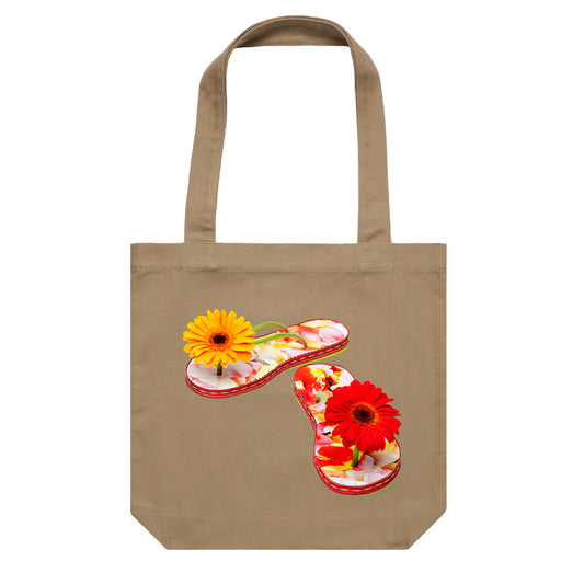 A gerbera jandals cotton canvas tote bag from Golly Gosh Creations. Crafted from colourful gerbera flowers. Colour khaki.