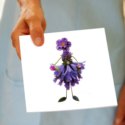 A lavender lady greeting card being held by hand. Available at Golly Gosh Creations. An elegant card created from fresh lavender. Size 142 x 142 mm.