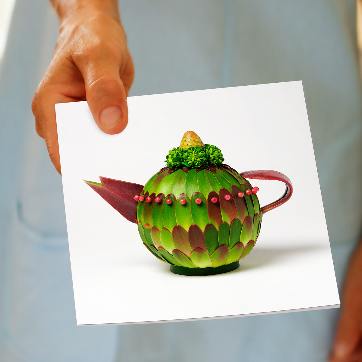 A hand held leucadendron teapot greeting card. Available from Golly Gosh Creations.
A quality square card created from lush leucadendron leaves.