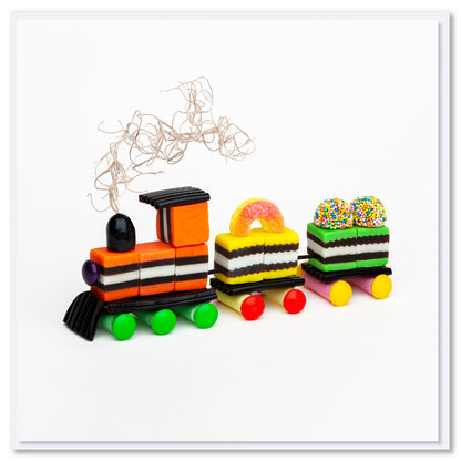 This liquorice allsorts train is from Golly Gosh Creations. A brightly coloured fun creation made from sweet confectionery. Size 142 x 142 mm