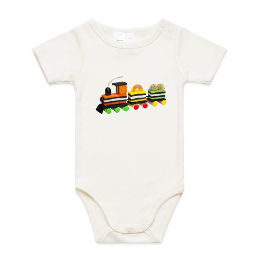 A fun liquorice train babygrow from Golly Gosh Creations. Crafted from sweet confectionery. A quality natural cotton garment available from 0 - 24 months.