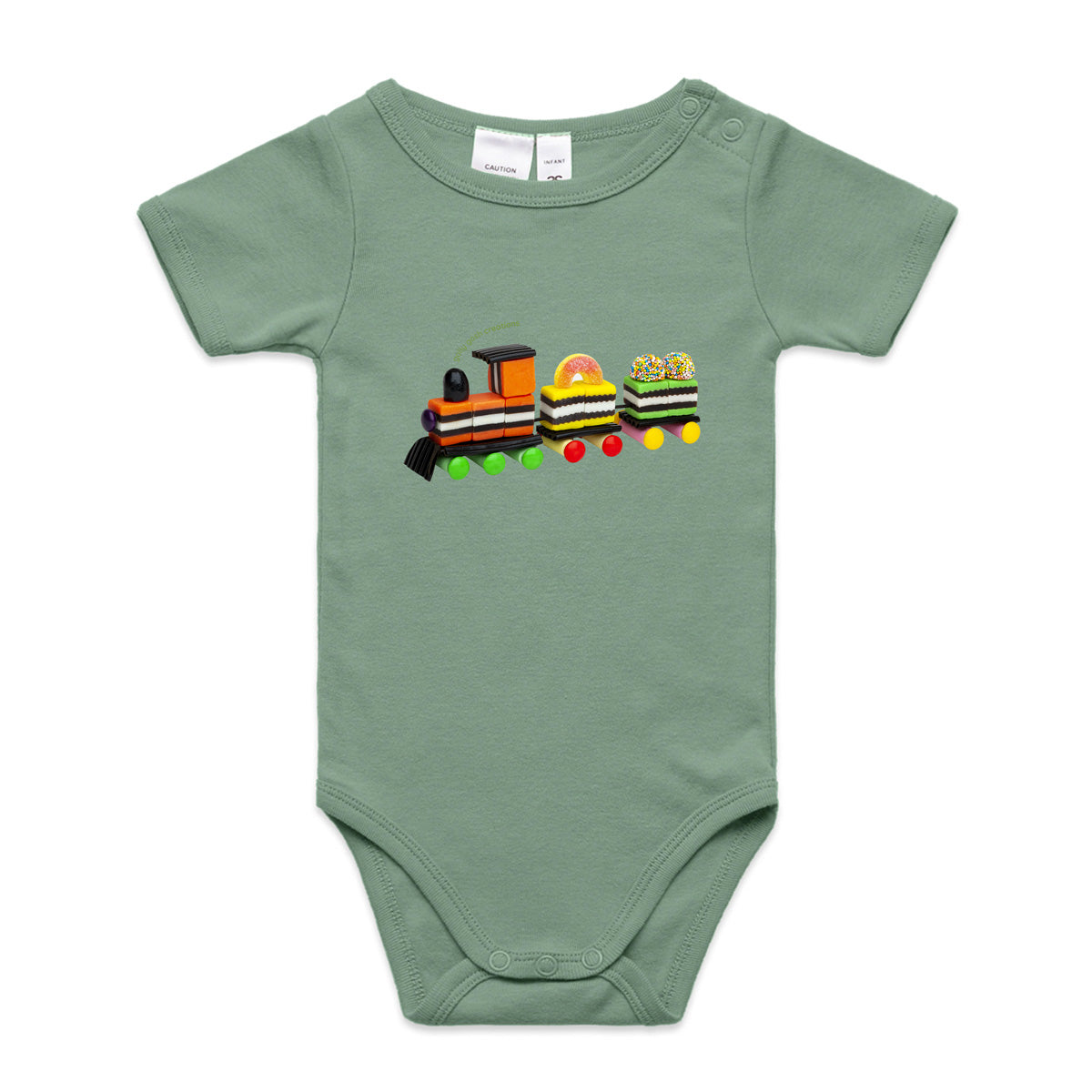 A fun liquorice train babygrow from Golly Gosh Creations. Crafted from sweet confectionery. A quality sage cotton garment available from 0 - 24 months.