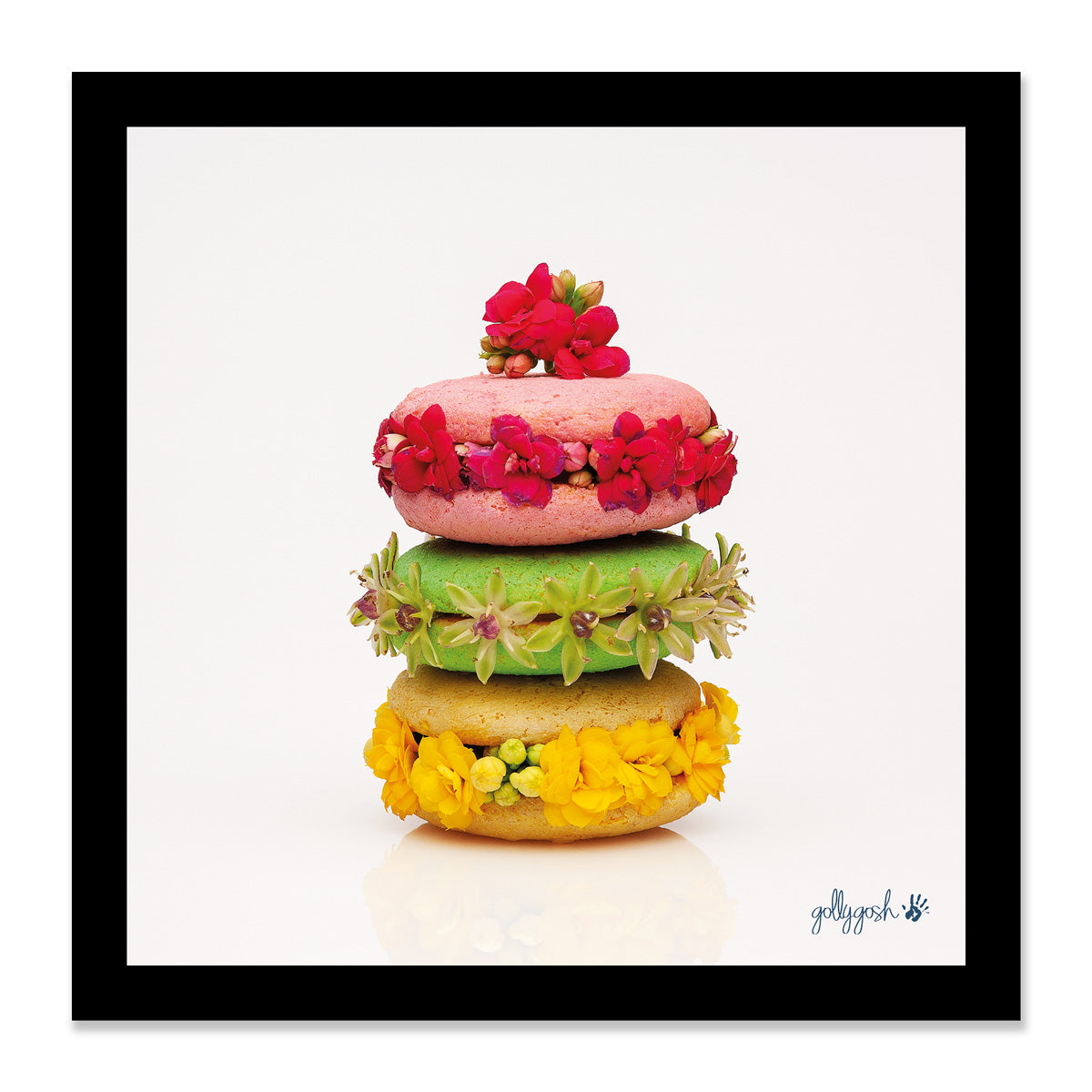 Mock up of a framed macaroon stack fine art print from Golly Gosh Creations. Available in three sizes ready for framing. 