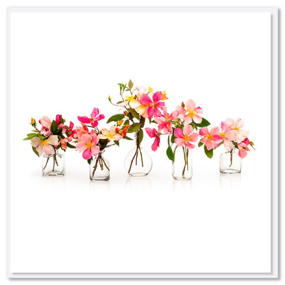 A pink rose vases greeting card from Golly Gosh Creations. Size 142 x 142 mm. A delightful arrangement of dainty pink roses in various vases.