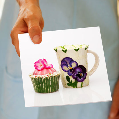 A hand held tea break greeting card from Golly Gosh Creations. This generous square greeting card is decorated with delicate and charming flowers. 