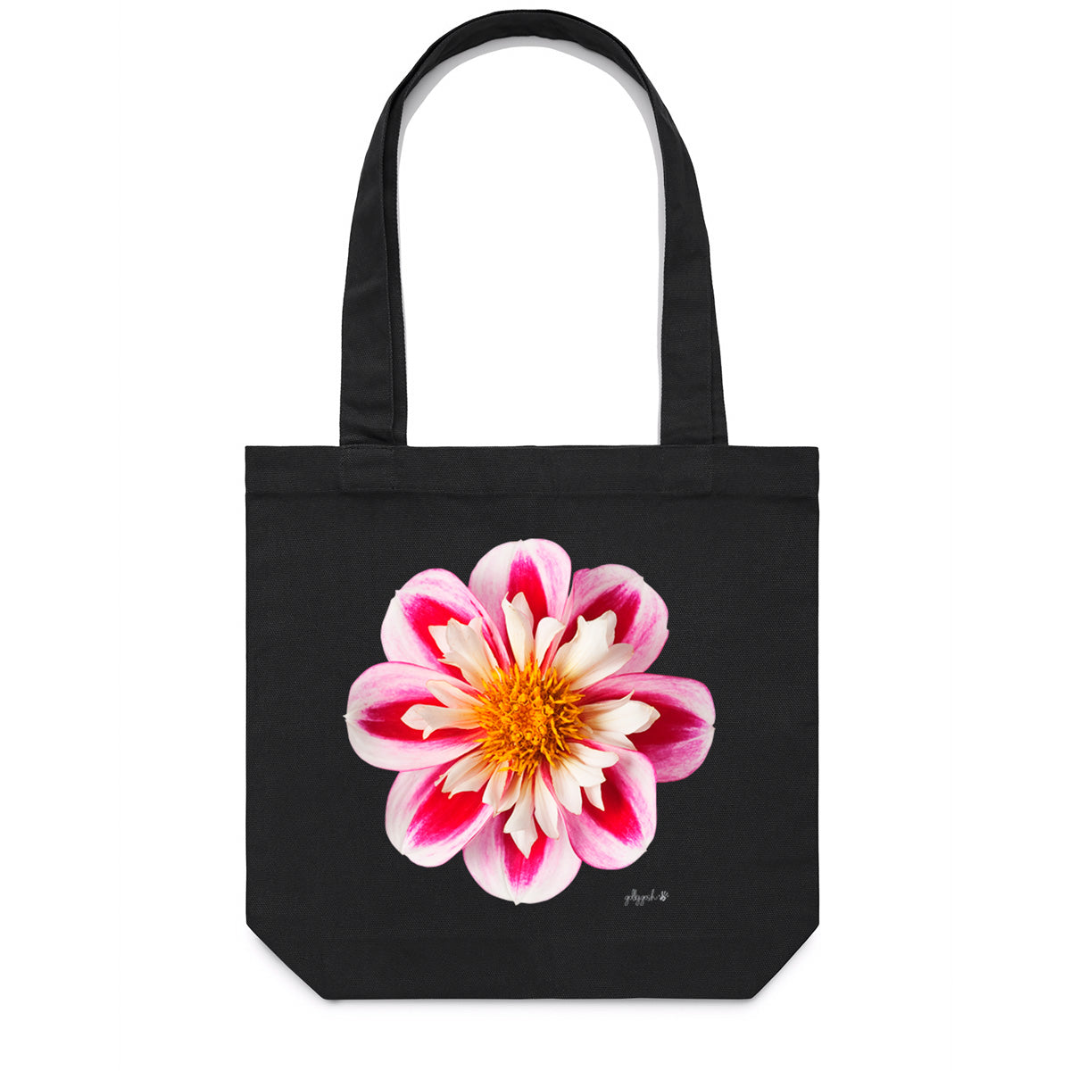 Black canvas tote bag featuring a vibrant variegated pink, red and white dahlia flower with a golden centre, by Golly Gosh Creations