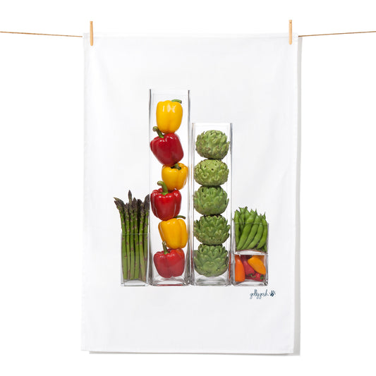 An elegant set of vases filled with vibrant fresh vegetables. A quality cotton tea towel from Golly Gosh Creations.