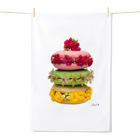 A colourful stack of macaroons made from real flowers on a quality tea towel from Golly Gosh Creations.